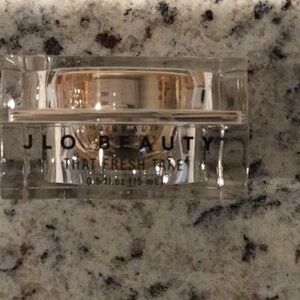 JLO Beauty Eye Cream in Clear Container